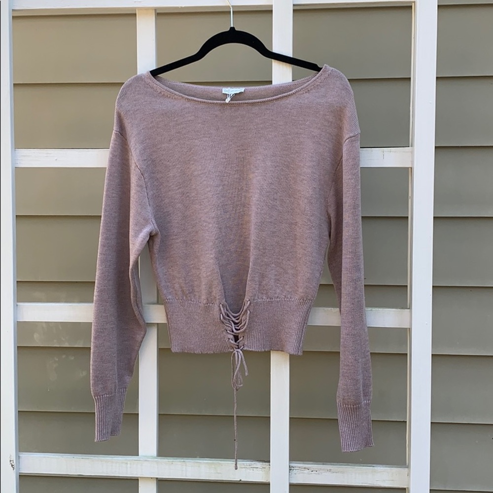Never worn. Bevello “Three Secrets Sweater.”